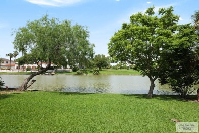 This stunning custom-built home is situated on an oversized on Rancho Viejo Resort and Country Club in Texas - for sale on GolfHomes.com, golf home, golf lot