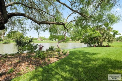 This stunning custom-built home is situated on an oversized on Rancho Viejo Resort and Country Club in Texas - for sale on GolfHomes.com, golf home, golf lot