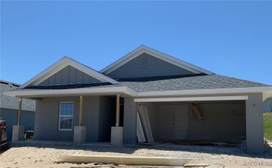 Handsome, inviting, and move-in ready, this 3-bedroom, 2-bath on Twisted Oaks Golf Club in Florida - for sale on GolfHomes.com, golf home, golf lot