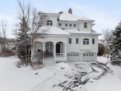 Indulge in the pinnacle of elegance and serenity with this on Bay Harbor Golf Club in Michigan - for sale on GolfHomes.com, golf home, golf lot