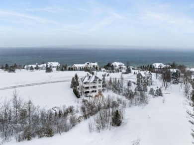 Indulge in the pinnacle of elegance and serenity with this on Bay Harbor Golf Club in Michigan - for sale on GolfHomes.com, golf home, golf lot