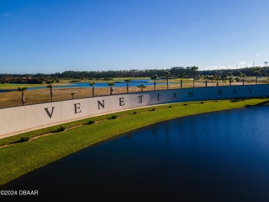 This light and bright two-story OPEN CONCEPT home in Venetian on Venetian Bay Golf Course in Florida - for sale on GolfHomes.com, golf home, golf lot