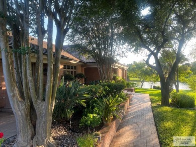 This stunning custom-built home is situated on an oversized on Rancho Viejo Resort and Country Club in Texas - for sale on GolfHomes.com, golf home, golf lot