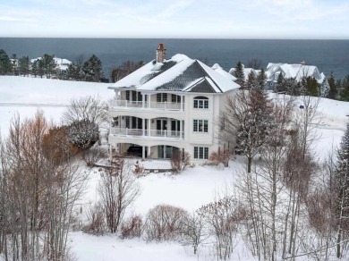 Indulge in the pinnacle of elegance and serenity with this on Bay Harbor Golf Club in Michigan - for sale on GolfHomes.com, golf home, golf lot