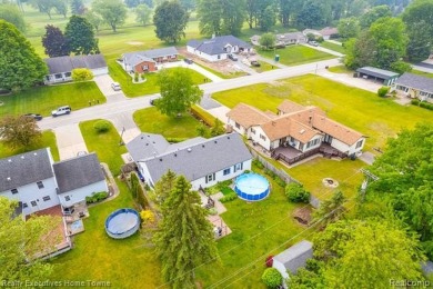 Move-in ready and family-friendly home in desirable Fort Gratiot on Port Huron Golf Club in Michigan - for sale on GolfHomes.com, golf home, golf lot