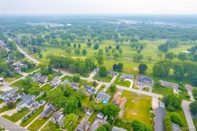 Move-in ready and family-friendly home in desirable Fort Gratiot on Port Huron Golf Club in Michigan - for sale on GolfHomes.com, golf home, golf lot