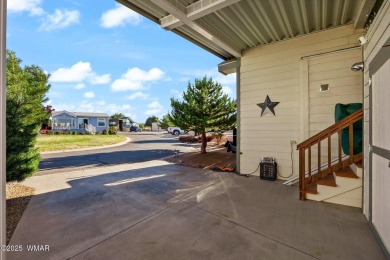 Turnkey waterfront home in sought-after Juniper Ridge Resort! on Juniper Ridge R.V. Golf Resort in Arizona - for sale on GolfHomes.com, golf home, golf lot