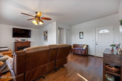 Turnkey waterfront home in sought-after Juniper Ridge Resort! on Juniper Ridge R.V. Golf Resort in Arizona - for sale on GolfHomes.com, golf home, golf lot