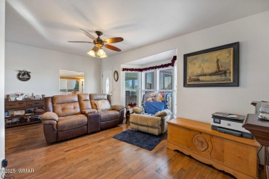 Turnkey waterfront home in sought-after Juniper Ridge Resort! on Juniper Ridge R.V. Golf Resort in Arizona - for sale on GolfHomes.com, golf home, golf lot