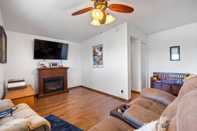Turnkey waterfront home in sought-after Juniper Ridge Resort! on Juniper Ridge R.V. Golf Resort in Arizona - for sale on GolfHomes.com, golf home, golf lot