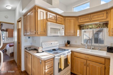 Turnkey waterfront home in sought-after Juniper Ridge Resort! on Juniper Ridge R.V. Golf Resort in Arizona - for sale on GolfHomes.com, golf home, golf lot
