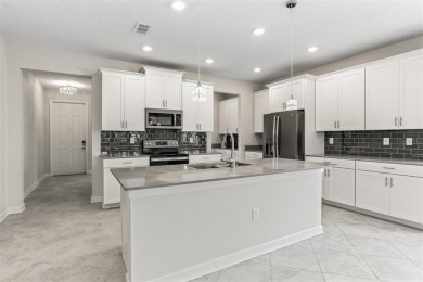 Don't miss out on this stunning 5-bed, 4.5-bath, 3,800+ sq ft on The Oasis Club at Champions Gate in Florida - for sale on GolfHomes.com, golf home, golf lot