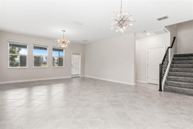 Don't miss out on this stunning 5-bed, 4.5-bath, 3,800+ sq ft on The Oasis Club at Champions Gate in Florida - for sale on GolfHomes.com, golf home, golf lot