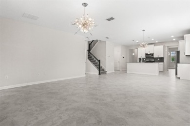 Don't miss out on this stunning 5-bed, 4.5-bath, 3,800+ sq ft on The Oasis Club at Champions Gate in Florida - for sale on GolfHomes.com, golf home, golf lot