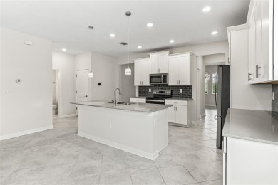Don't miss out on this stunning 5-bed, 4.5-bath, 3,800+ sq ft on The Oasis Club at Champions Gate in Florida - for sale on GolfHomes.com, golf home, golf lot