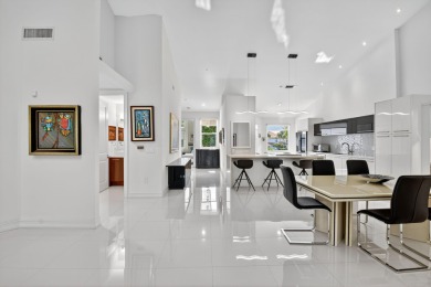 Experience luxury in this renovated 2nd-floor penthouse located on Broken Sound Golf and Club  in Florida - for sale on GolfHomes.com, golf home, golf lot