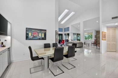 Experience luxury in this renovated 2nd-floor penthouse located on Broken Sound Golf and Club  in Florida - for sale on GolfHomes.com, golf home, golf lot