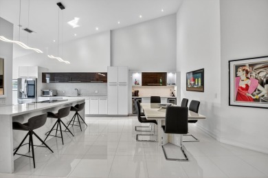 Experience luxury in this renovated 2nd-floor penthouse located on Broken Sound Golf and Club  in Florida - for sale on GolfHomes.com, golf home, golf lot