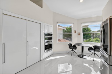 Experience luxury in this renovated 2nd-floor penthouse located on Broken Sound Golf and Club  in Florida - for sale on GolfHomes.com, golf home, golf lot