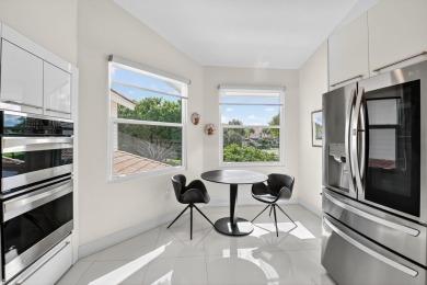 Experience luxury in this renovated 2nd-floor penthouse located on Broken Sound Golf and Club  in Florida - for sale on GolfHomes.com, golf home, golf lot