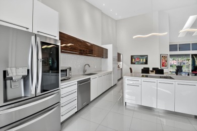 Experience luxury in this renovated 2nd-floor penthouse located on Broken Sound Golf and Club  in Florida - for sale on GolfHomes.com, golf home, golf lot