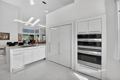 Experience luxury in this renovated 2nd-floor penthouse located on Broken Sound Golf and Club  in Florida - for sale on GolfHomes.com, golf home, golf lot