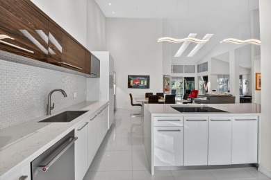 Experience luxury in this renovated 2nd-floor penthouse located on Broken Sound Golf and Club  in Florida - for sale on GolfHomes.com, golf home, golf lot