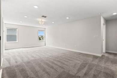 Don't miss out on this stunning 5-bed, 4.5-bath, 3,800+ sq ft on The Oasis Club at Champions Gate in Florida - for sale on GolfHomes.com, golf home, golf lot