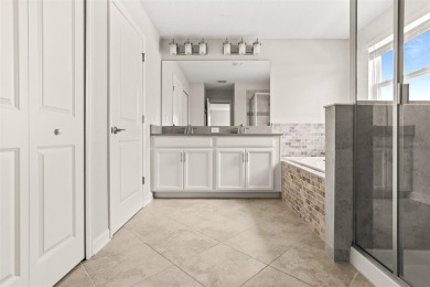 Don't miss out on this stunning 5-bed, 4.5-bath, 3,800+ sq ft on The Oasis Club at Champions Gate in Florida - for sale on GolfHomes.com, golf home, golf lot