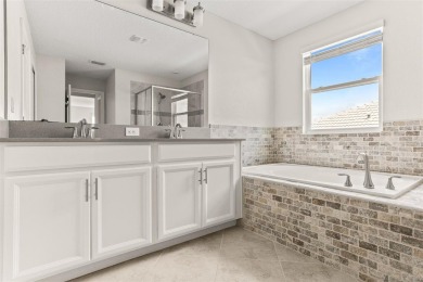 Don't miss out on this stunning 5-bed, 4.5-bath, 3,800+ sq ft on The Oasis Club at Champions Gate in Florida - for sale on GolfHomes.com, golf home, golf lot
