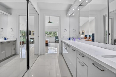 Experience luxury in this renovated 2nd-floor penthouse located on Broken Sound Golf and Club  in Florida - for sale on GolfHomes.com, golf home, golf lot