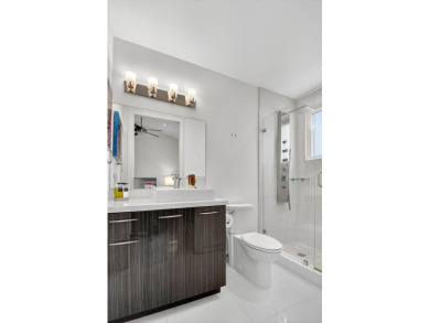 Experience luxury in this renovated 2nd-floor penthouse located on Broken Sound Golf and Club  in Florida - for sale on GolfHomes.com, golf home, golf lot