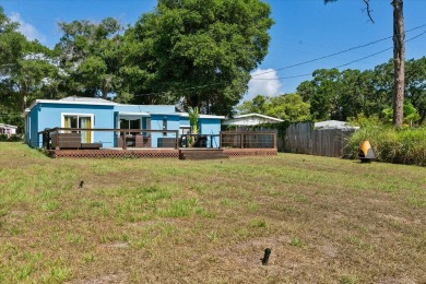 This home qualifies for community lending, which allows between on Clearwater Country Club in Florida - for sale on GolfHomes.com, golf home, golf lot