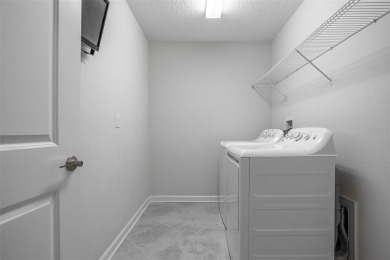 Don't miss out on this stunning 5-bed, 4.5-bath, 3,800+ sq ft on The Oasis Club at Champions Gate in Florida - for sale on GolfHomes.com, golf home, golf lot
