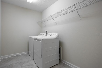 Don't miss out on this stunning 5-bed, 4.5-bath, 3,800+ sq ft on The Oasis Club at Champions Gate in Florida - for sale on GolfHomes.com, golf home, golf lot