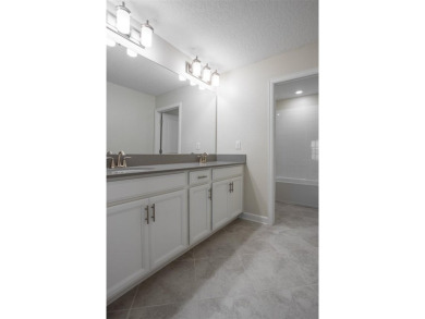 Don't miss out on this stunning 5-bed, 4.5-bath, 3,800+ sq ft on The Oasis Club at Champions Gate in Florida - for sale on GolfHomes.com, golf home, golf lot