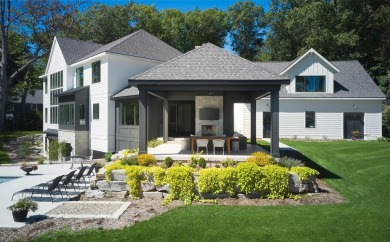 The Fairway Lodge at the Estates of Pine Glen in Saugatuck is a on Ravines Golf Club in Michigan - for sale on GolfHomes.com, golf home, golf lot