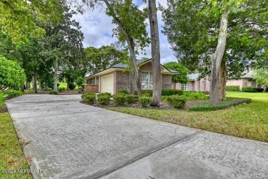 Discover this all-brick ranch-style home in the desirable on Hidden Hills Country Club in Florida - for sale on GolfHomes.com, golf home, golf lot