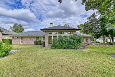 Discover this all-brick ranch-style home in the desirable on Hidden Hills Country Club in Florida - for sale on GolfHomes.com, golf home, golf lot