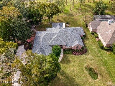 Discover this all-brick ranch-style home in the desirable on Hidden Hills Country Club in Florida - for sale on GolfHomes.com, golf home, golf lot