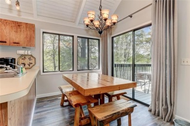 This spectacular villa offers seasonal views of Lake Petit and on Big Canoe Golf Club - Cherokee in Georgia - for sale on GolfHomes.com, golf home, golf lot