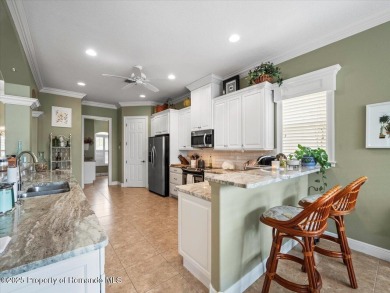 This Glen Lakes Estate Home features a BRAND-NEW ROOF completed on Glen Lakes Country Club in Florida - for sale on GolfHomes.com, golf home, golf lot