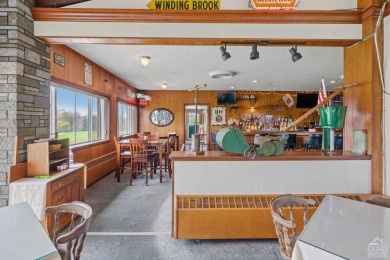 Own a piece of history with this unique mid-century modern on Winding Brook Country Club in New York - for sale on GolfHomes.com, golf home, golf lot