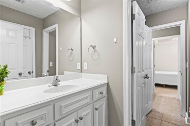 This thoughtfully designed 4-bedroom, 3-bathroom all-brick home on Moores Mill Golf Club in Alabama - for sale on GolfHomes.com, golf home, golf lot