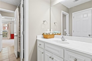 This thoughtfully designed 4-bedroom, 3-bathroom all-brick home on Moores Mill Golf Club in Alabama - for sale on GolfHomes.com, golf home, golf lot