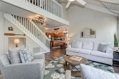 This spectacular villa offers seasonal views of Lake Petit and on Big Canoe Golf Club - Cherokee in Georgia - for sale on GolfHomes.com, golf home, golf lot