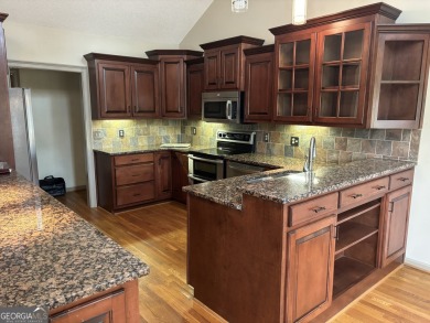 What a classy Kitchen! w/ granite countertops / worlds of on Honey Creek Country Club in Georgia - for sale on GolfHomes.com, golf home, golf lot