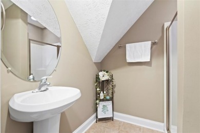 This thoughtfully designed 4-bedroom, 3-bathroom all-brick home on Moores Mill Golf Club in Alabama - for sale on GolfHomes.com, golf home, golf lot