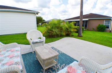 Welcome to this charming 2-bedroom, 2-bath home in the popular on Tampa Bay Golf and Country Club in Florida - for sale on GolfHomes.com, golf home, golf lot