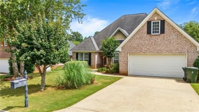 This thoughtfully designed 4-bedroom, 3-bathroom all-brick home on Moores Mill Golf Club in Alabama - for sale on GolfHomes.com, golf home, golf lot